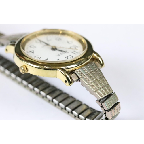 219 - A small collection of three ladies wristwatches to include a Seiko Titanium example.