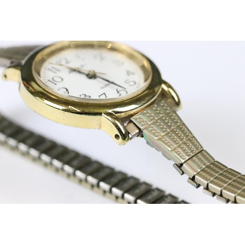 219 - A small collection of three ladies wristwatches to include a Seiko Titanium example.