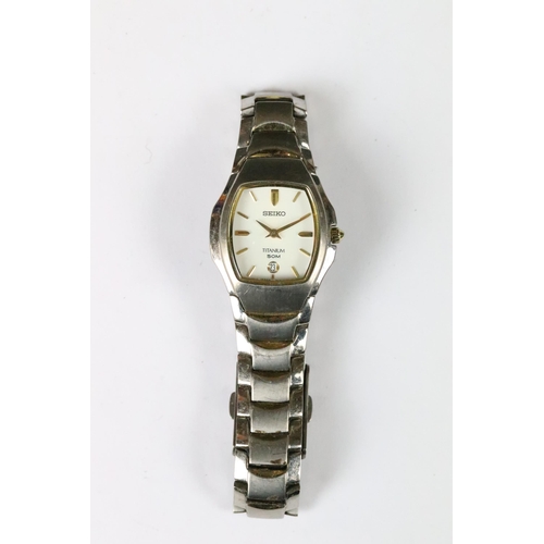 219 - A small collection of three ladies wristwatches to include a Seiko Titanium example.