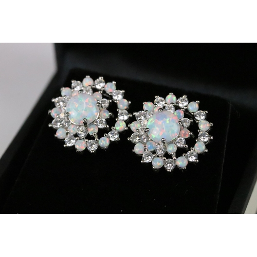 224 - Pair of silver, CZ and opal panelled cluster earrings