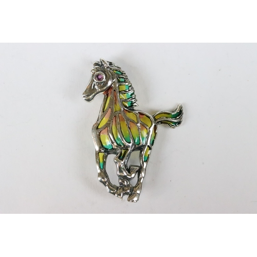 233 - Silver and plique-a-jour horse brooch with ruby eye