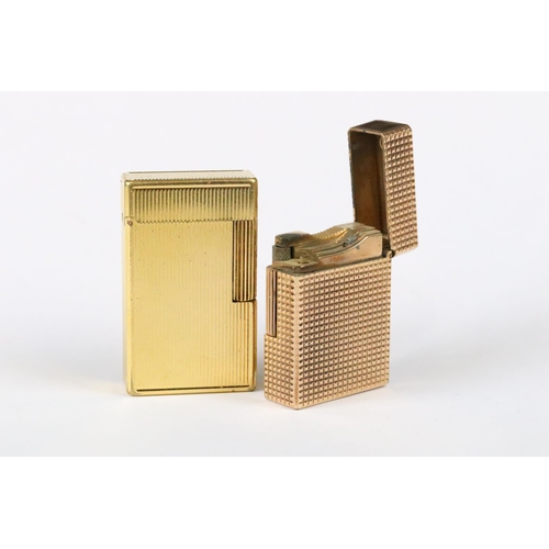 240 - Two vintage mid 20th century Dupont pocket gas cigarette lighters.