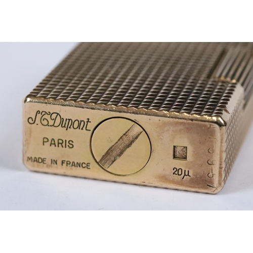 240 - Two vintage mid 20th century Dupont pocket gas cigarette lighters.