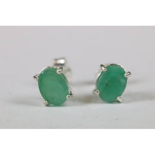 241 - Pair of emerald stud earrings on silver posts