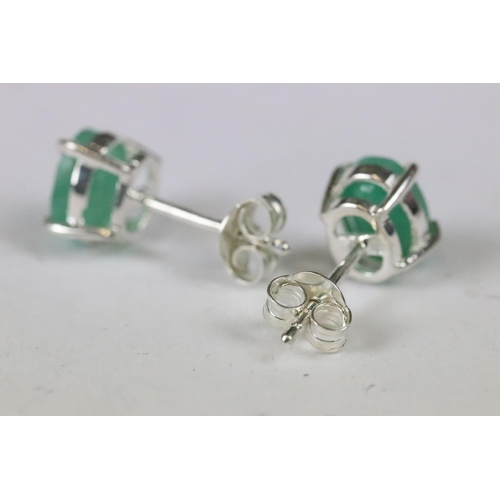 241 - Pair of emerald stud earrings on silver posts