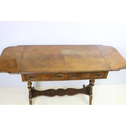 569 - 20th century mahogany sofa table with two drop leaves above two drawers on turned supports, 72.5cm h... 