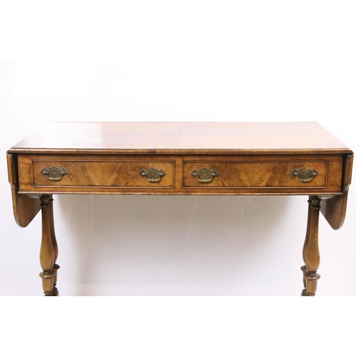 569 - 20th century mahogany sofa table with two drop leaves above two drawers on turned supports, 72.5cm h... 