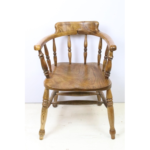 585 - Early 20th Century elm captains elbow chair having turned supports with H stretcher to base, raised ... 