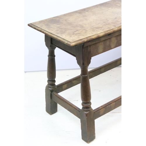 586 - Early 20th century rectangular oak bench on turned supports with stretchered base, 53.5cm high x 91c... 