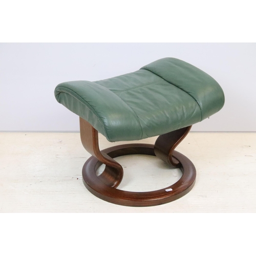 589 - Ekornes Stressless green leather arm chair with matching footstool. Measures 100 x 84 x 70cm.