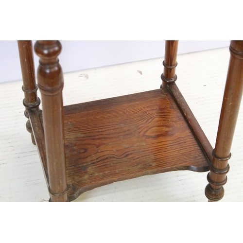 592 - Early 20th century pine bedside pot stand, the inset marble top above single drawer and fall front c... 