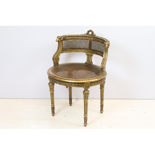 594 - Louis XV1 gilt wood vanity chair with cane, cane back rest with wreath and ram scroll carved detail ... 