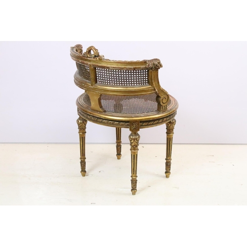 594 - Louis XV1 gilt wood vanity chair with cane, cane back rest with wreath and ram scroll carved detail ... 