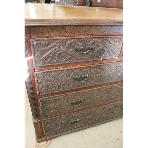 563 - 19th century and later, carved oak chest of two short and three long elaborately carved drawers, wit... 