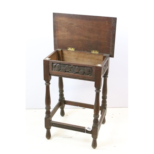 602 - Early 20th century oak stool, the top carved with thistles on turned legs and stretchered base, 61cm... 