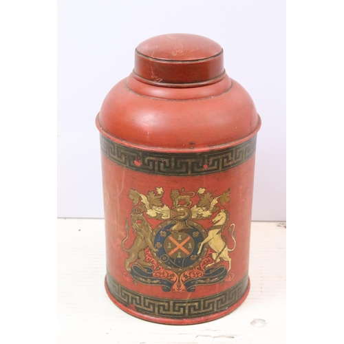 604 - Pair of early 20th century tole peint tea canisters, each decorated with coat of arms, 45cm high