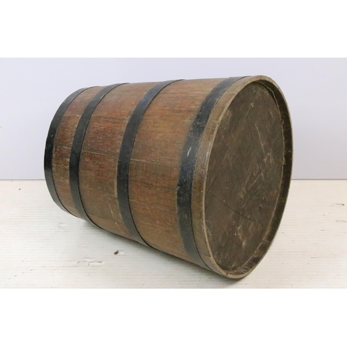 606 - Early 20th century oak tapering coopered barrel, 51cm high x 35.5cm diameter (top)