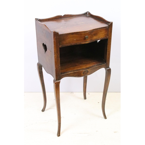 611 - Pair of 20th century mahogany bedside cupboards, with serpentine front and single drawer, with heart... 