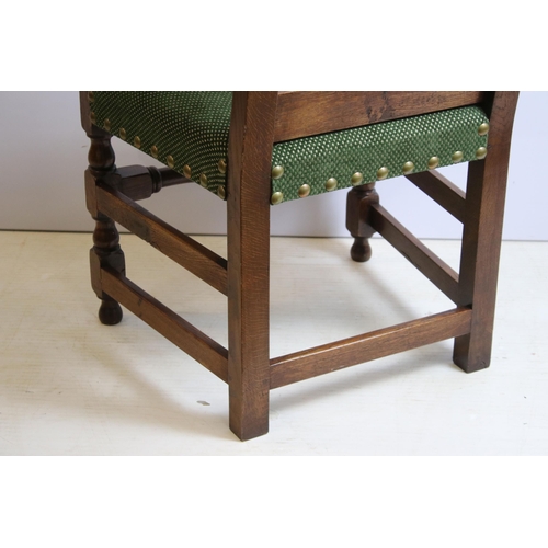 622 - Bylaw The Furniture Makers oval oak refectory table with ten chairs, the planked top, above substant... 