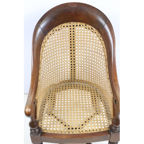 580 - Antique Regency mahogany child's chair with caned frame and stretcher to base, H 66cm