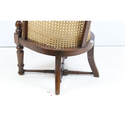 580 - Antique Regency mahogany child's chair with caned frame and stretcher to base, H 66cm