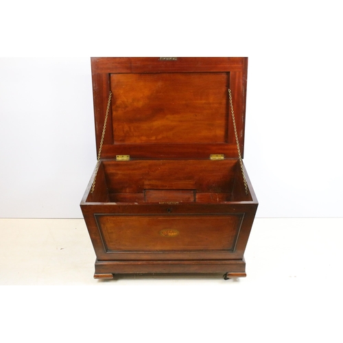 621 - Edwardian mahogany cellarette of sarcophagus form, with hinged lid, with parquetry shell inlaid fron... 