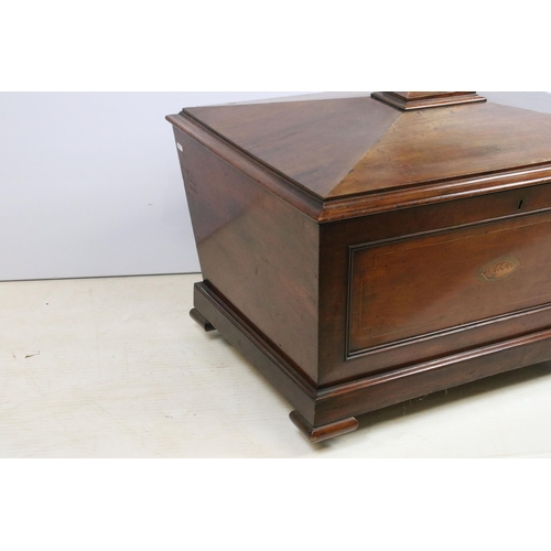 621 - Edwardian mahogany cellarette of sarcophagus form, with hinged lid, with parquetry shell inlaid fron... 