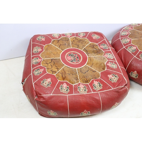 625 - Pair of leather and snakeskin patch pouffes footstools, in square and round form with coat of arms c... 