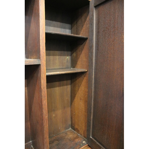 629 - Late 19th century oak sideboard, with pediment above sectional top featuring an arrangement of shelv... 