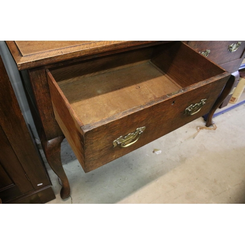 629 - Late 19th century oak sideboard, with pediment above sectional top featuring an arrangement of shelv... 