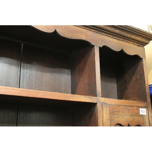 629 - Late 19th century oak sideboard, with pediment above sectional top featuring an arrangement of shelv... 