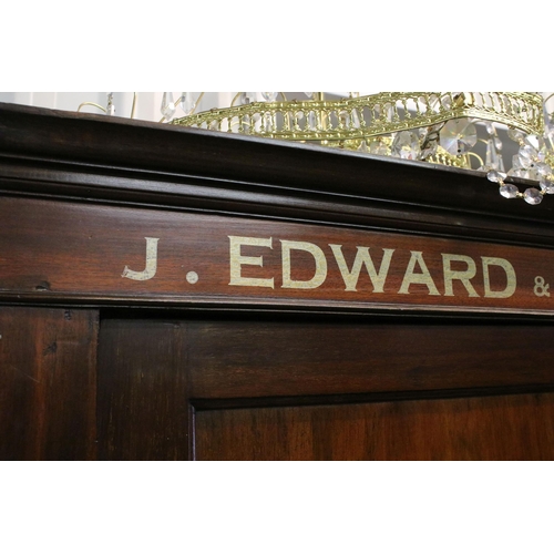 630 - Early 20th century mahogany single wardrobe, gilt painted ' J. Edward & Son Est 1910 Hatter Outfitte... 