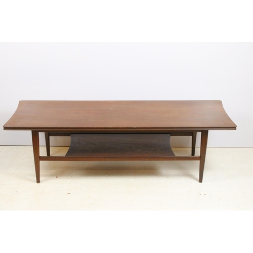 633 - Mid century hardwood shaped rectangular two tier coffee table on square tapering legs, 36cm high x 1... 