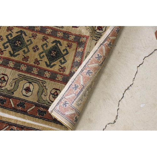 637 - Pair of 20th century cream ground wool work runners, with geometric design, each 253 x 70cm