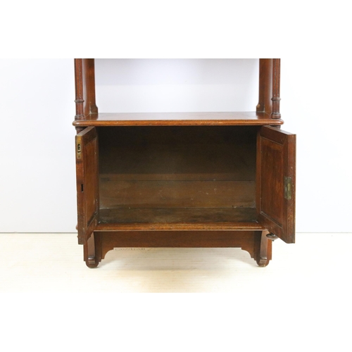 638 - Late 19th century mahogany hanging wall cabinet, with shaped pediment above open recess and pair of ... 