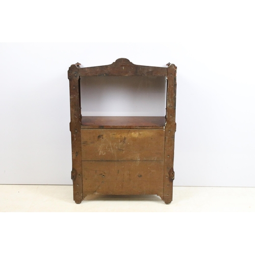 638 - Late 19th century mahogany hanging wall cabinet, with shaped pediment above open recess and pair of ... 