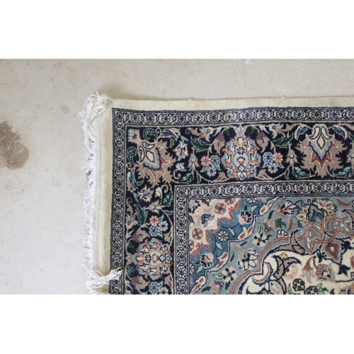 640 - 20th century wool work cream ground carpet with central medallion within borders, 213 x 140cm