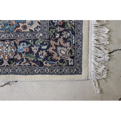 640 - 20th century wool work cream ground carpet with central medallion within borders, 213 x 140cm