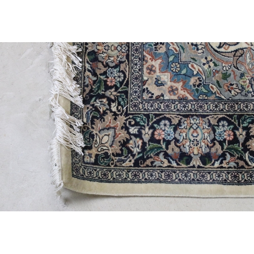 640 - 20th century wool work cream ground carpet with central medallion within borders, 213 x 140cm