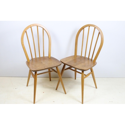 644 - Pair of Ercol chairs, model 400, beech and elm stick, one with partial label, 85cm high x 39.5cm wid... 