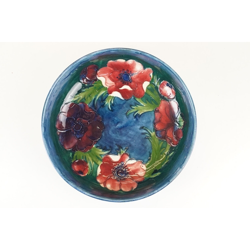 12 - William Moorcroft small floral pattern squat vase, H 6.5cm together with a Moorcroft Anemone centre ... 