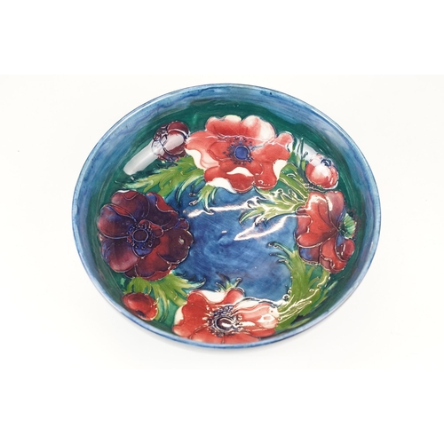 12 - William Moorcroft small floral pattern squat vase, H 6.5cm together with a Moorcroft Anemone centre ... 