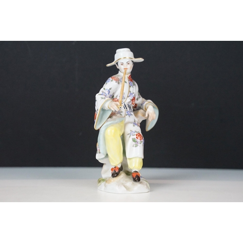 18 - Early 20th century Meissen figurine in the form of a Japanese man in floral robe with pipe, crossed ... 