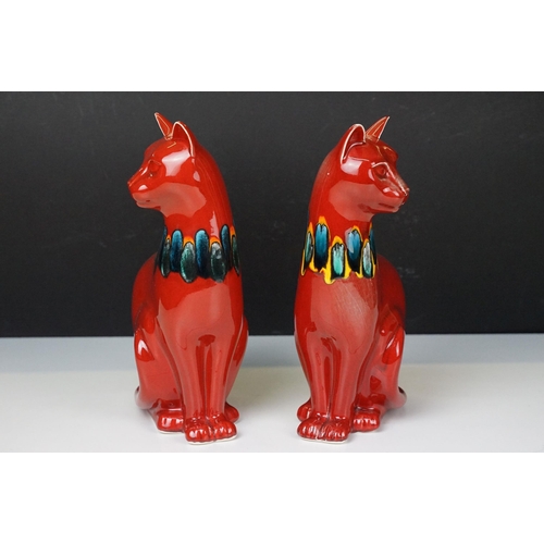 39 - Pair of Poole Pottery living glaze red cat figurines, H 30cm