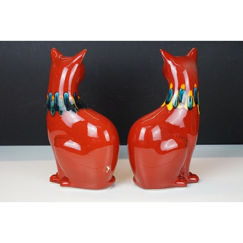 39 - Pair of Poole Pottery living glaze red cat figurines, H 30cm