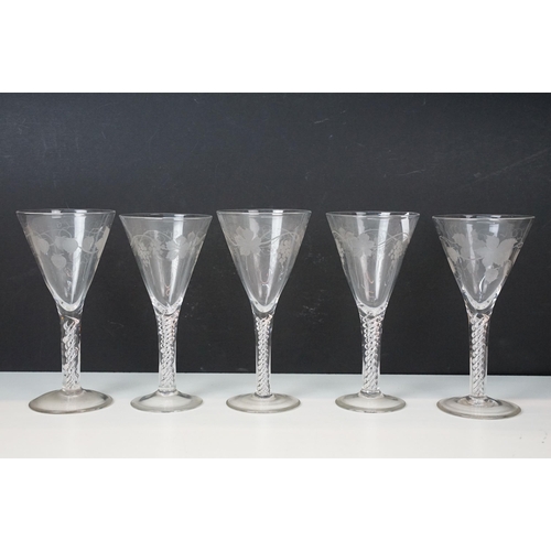 40 - Group of five Victorian hand blown fluted glasses with vine leaf etched detailing and double twist s... 