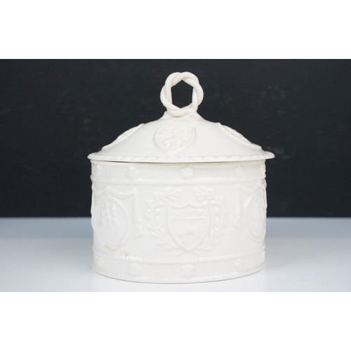 48 - Leedsware creamware embossed lidded pot with heraldry design and twisted handle, stamped to base, H ... 