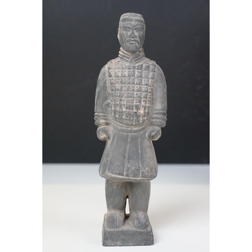 67 - Two Chinese terracotta warrior soldier figurines on square bases, H 20.5cm