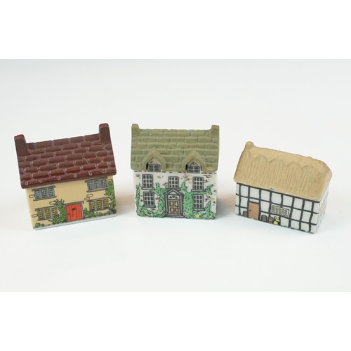 70 - Quantity of Wade Whimsey-on-Why miniature ceramic houses, to include Bloodshot Hall, Picture Palace,... 