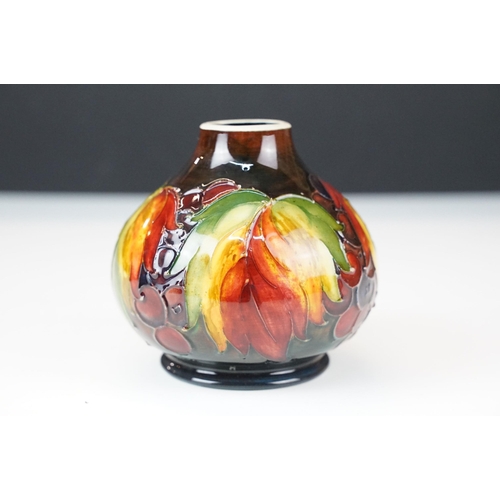 1 - William Moorcroft 'leaf and berry' pattern small vase. signed and stamped to base. H 11cm, W 11cm